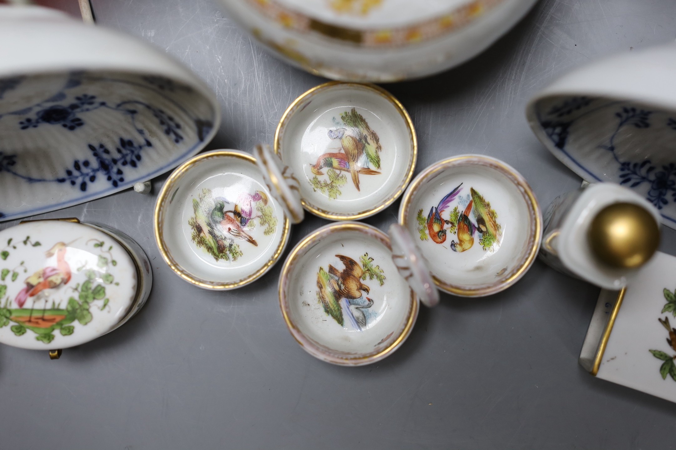 A Meissen figure of boy, two Meissen twin section salts, a Herend teapot and two matchbox holders, two ruby glass comports etc (11), teapot 13 cms high